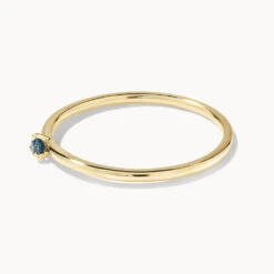 Micro Blue Topaz Round Solitaire Ring In 10k Gold