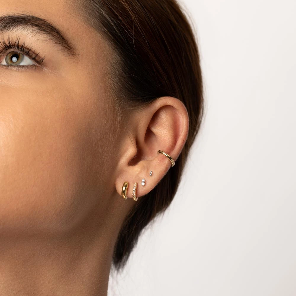 Midi Huggie Earrings In Gold 9 Midi Huggie Earrings In Gold - Image 9