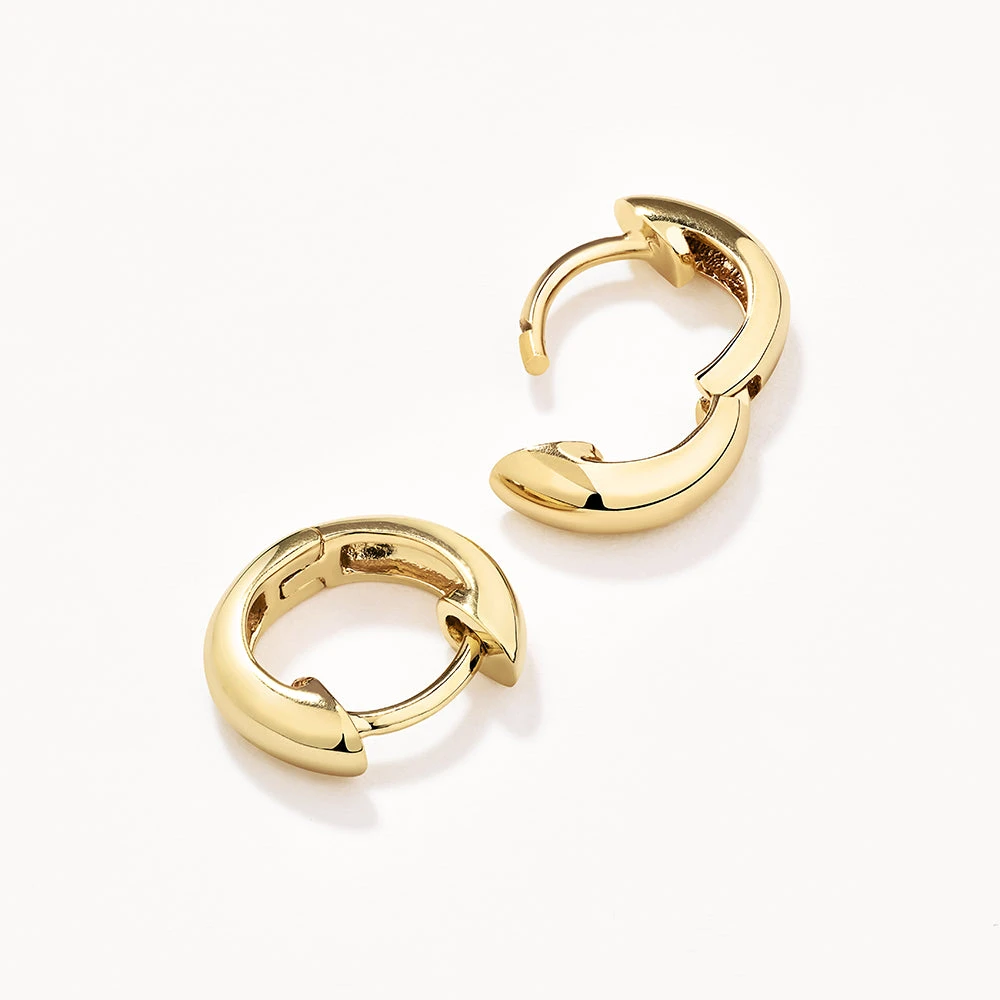 Midi Huggie Earrings In Gold 10 Midi Huggie Earrings In Gold - Image 10