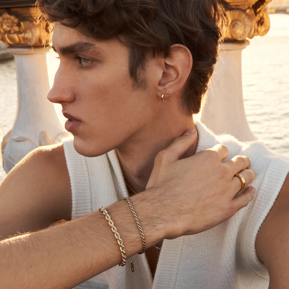 Midi Huggie Earrings In Gold 5 Midi Huggie Earrings In Gold - Image 5