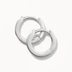 Mini Charm Huggie Earrings In Silver