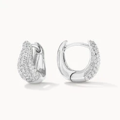 Mini White Topaz Pave Wave Dome Huggies In Silver