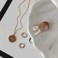 White Topaz Rainbow Huggie Earrings In Rose Gold -Fashion Accessories Store rainbow huggie earrings in rose gold medley earrings 37572870176998