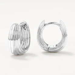 Ribbed Dome Huggie Earrings In Silver