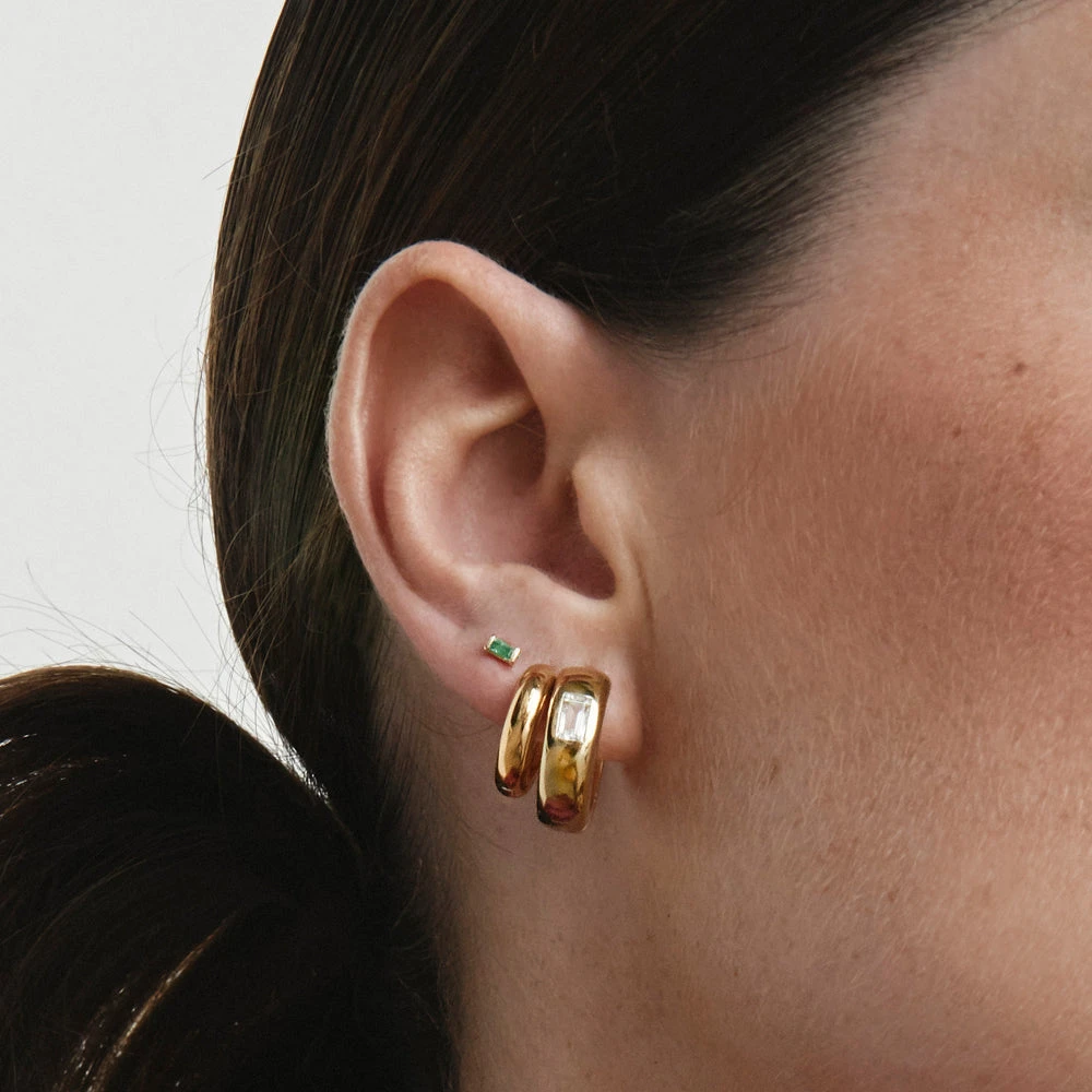 White Topaz Baguette Curve Huggies In Gold 6 White Topaz Baguette Curve Huggies In Gold - Image 6