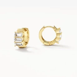 White Topaz Baguette Textured Huggie Earrings In Gold
