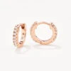 White Topaz Rainbow Huggie Earrings In Rose Gold